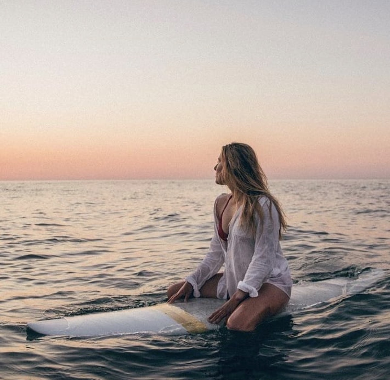 Mermaid dreams with beautiful girl in the surf